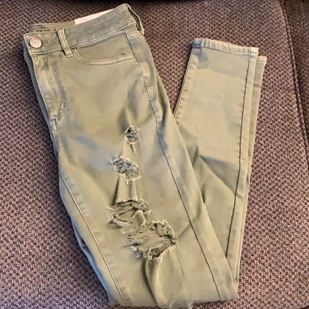 GREEN RIPPED AE JEANS